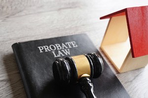 How are debts and taxes handled in probate?